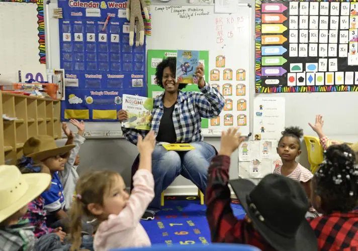 A teacher teaching inside a classroom